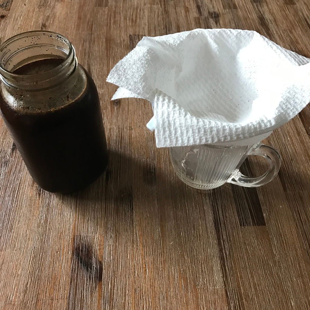 diy cold brew coffee filtering process paper towel mesh strainer jug