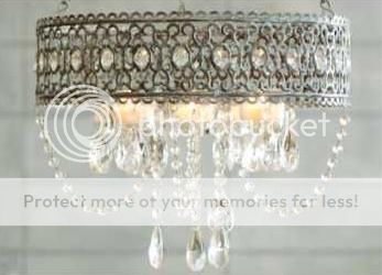   is a brand new french scroll petite chandelier the color available